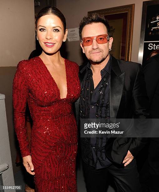 Catherine Zeta-Jones and Bono of U2 attend the 65th Annual Tony Awards at the Beacon Theatre on June 12, 2011 in New York City.