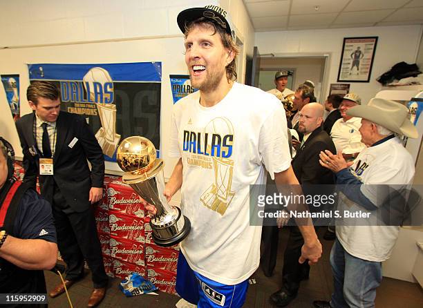 Dirk Nowitzki of the Dallas Mavericks celebrates after winning the NBA Championship by defeating the Miami Heat during Game Six of the 2011 NBA...