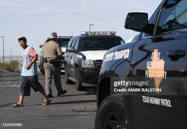 Texas State Troopers keep watch outside the Cielo Vista Mall Wal-Mart where a shooting left 20 people dead in El Paso, Texas, on August 4, 2019. -...