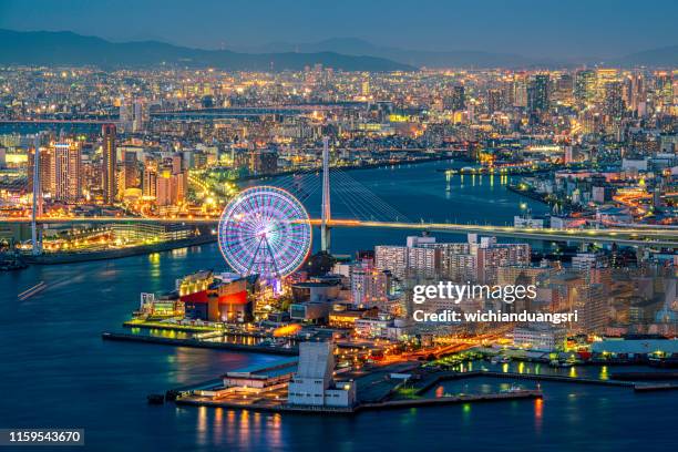 osaka cityscape - stadt osaka stock-fotos und bilder