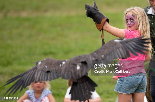 Savannah Phillips during a Faclonry display at the 2019 Festival of British Eventing at Gatcombe Park on August 4, 2019 in Stroud, England.