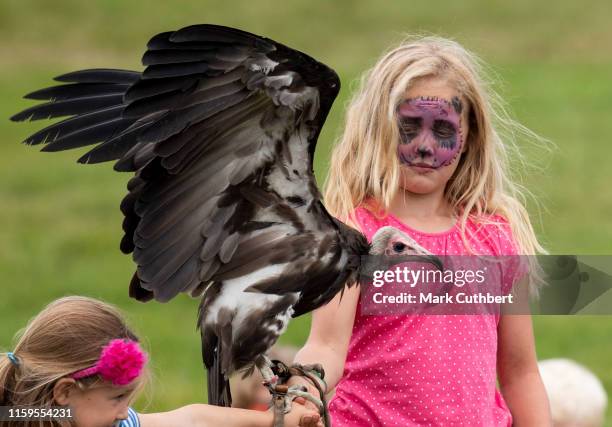 Savannah Phillips during a Faclonry display at the 2019 Festival of British Eventing at Gatcombe Park on August 4, 2019 in Stroud, England.