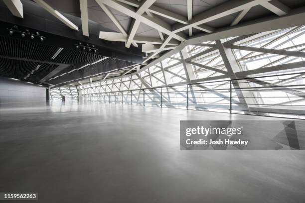 futuristic empty room, 3d rendering - airplane hangar stock pictures, royalty-free photos & images