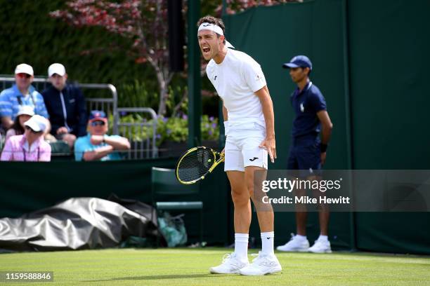 Marco Cecchinato of Italy reacts in his Men's Singles first round match against Alex de Minaur of Australia during Day two of The Championships -...