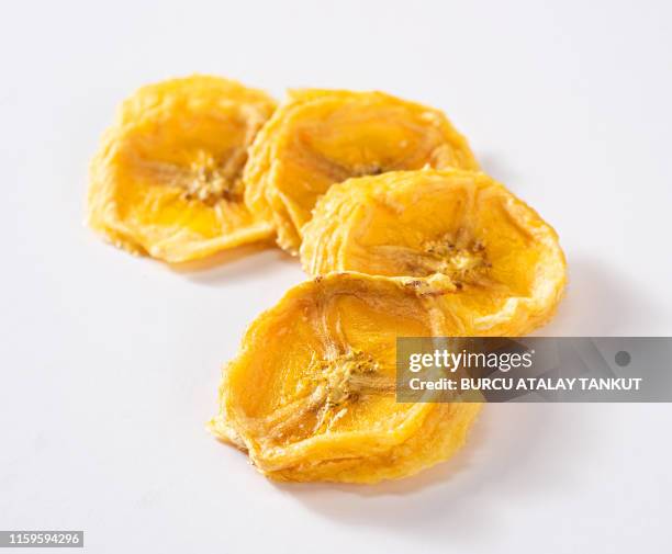 dried banana chips - dried food stock pictures, royalty-free photos & images