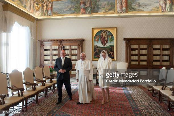 Pope Francis meeting the Prince Albert II of Monaco and his wife Charlene Wittstock in the Private Library Of The Apostolic Palace. Vatican City,...