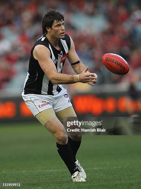 Leigh Brown of the Magpies in action during the round 12 AFL match between the Melbourne Demons and the Collingwood Magpies at Melbourne Cricket...