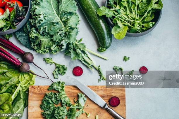 fresh vegetable on concrete table - kale stock pictures, royalty-free photos & images