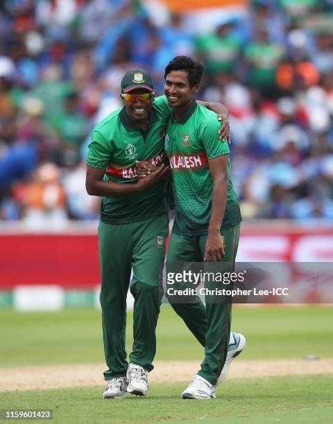 Mustafizur Rahman of Bangladesh celebrates after taking the wicket of Mohammed Shami of India for his fifth wicket during the Group Stage match of...