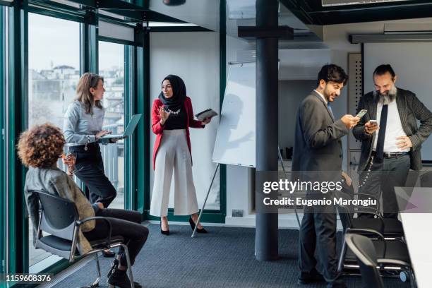 business partners at brainstorming meeting in office - selective focus foto e immagini stock