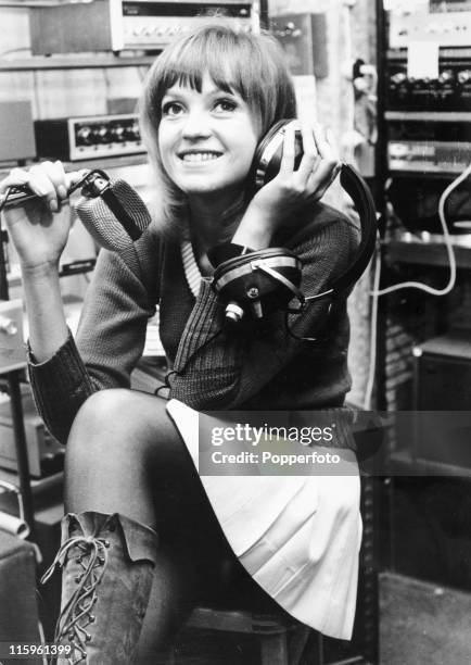 Radio One disc jockey Annie Nightingale on air in London on 7th December 1970. .