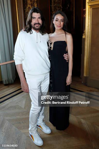 Designer Stephane Rolland and Sofia Essaidi pose after the Stephane Rolland Haute Couture Fall/Winter 2019 2020 show as part of Paris Fashion Week on...