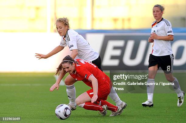 Carolin Simon of Germany competes with Michelle Probst of Switzerland during semifinal game between Germany and Switzerland of Women's Under 19...