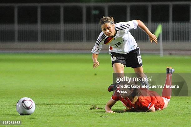 Anja Hegenauer of Germany competes with Gwendoline Fai of Switzerland during semifinal game between Germany and Switzerland of Women's Under 19...