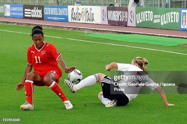 Carolin Simon of Germany competes with Eseosa Aigbogun of Switzerland during semifinal game between Germany and Switzerland of Women's Under 19...