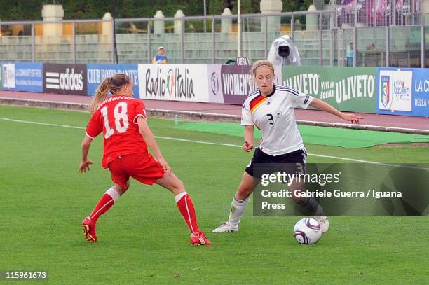 Carolin Simon of Germany competes with Natasha Gensetter of Switzerland during semifinal game between Germany and Switzerland of Women's Under 19...