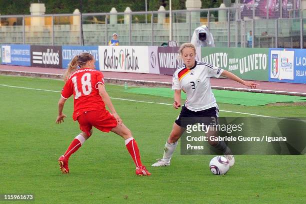 Carolin Simon of Germany competes with Natasha Gensetter of Switzerland during semifinal game between Germany and Switzerland of Women's Under 19...