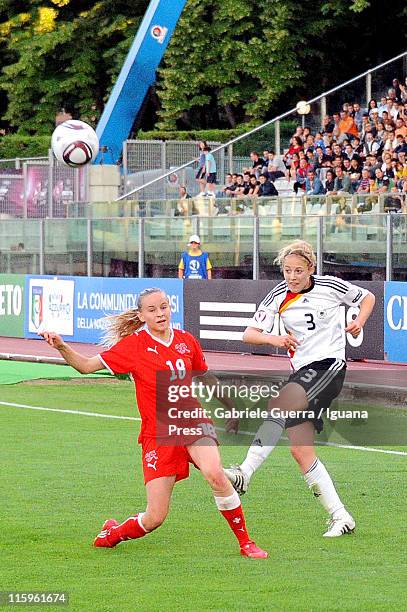 Carolin Simon of Germany competes with Natasha Gensetter of Switzerland during semifinal game between Germany and Switzerland of Women's Under 19...