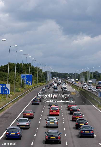 traffic - motorway uk stock pictures, royalty-free photos & images