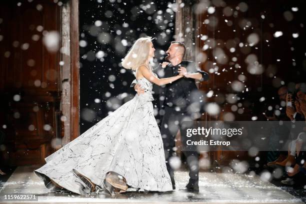 Designer Julien Fournie dancing with a model at the Julien Fournie show during Paris Haute Couture Fall/Winter 2019/2020 on July 2, 2019 in Paris,...