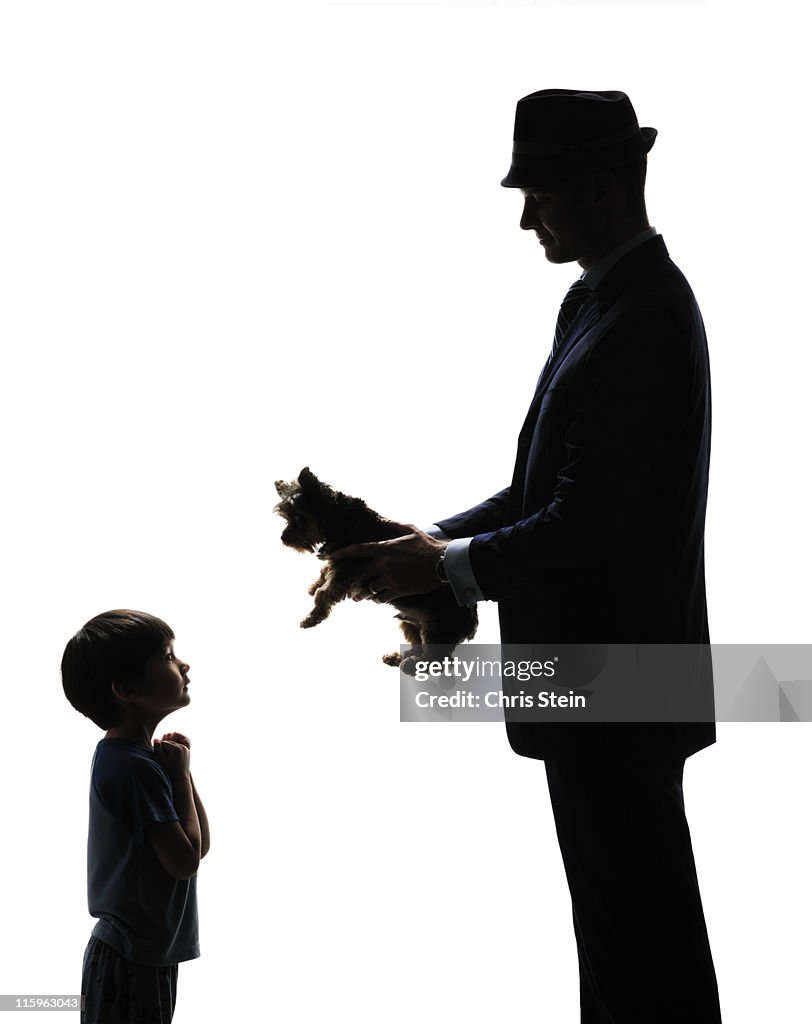 Business Man Dad Brings Son Home a Dog