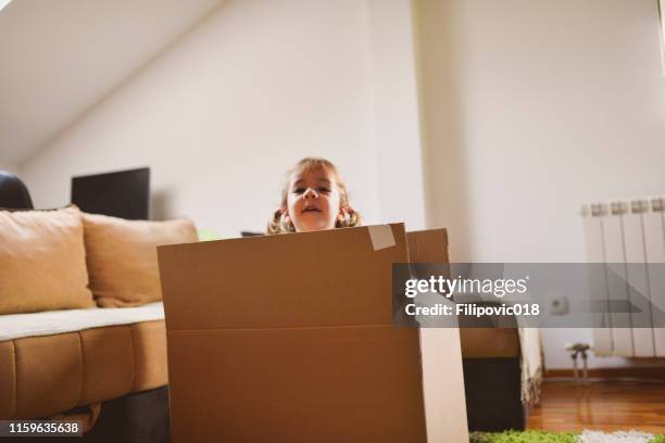 Hiding In Box 1,694 Hiding Inside A Box Stock Photos, High-Res Pictures, and Images ...