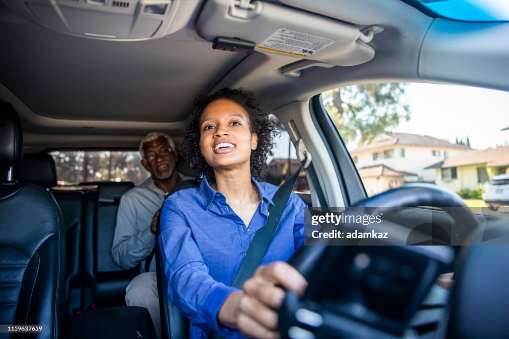 Young Black Woman Driving Car for Rideshare