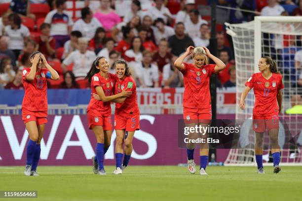 Christen Press of the USA celebrates with teammate Kelley O'hara after scoring her team's first goal during the 2019 FIFA Women's World Cup France...