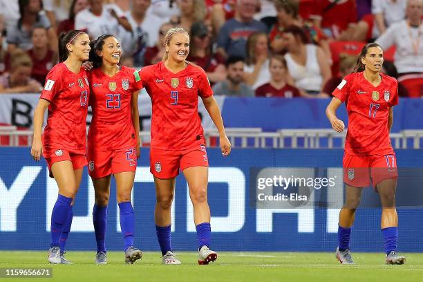 Christen Press of the USA celebrates with teammates after scoring her team's first goal during the 2019 FIFA Women's World Cup France Semi Final...