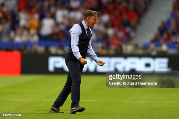 Philip Neville, Head Coach of England celebrates after Ellen White of England scores his team's first goal during the 2019 FIFA Women's World Cup...