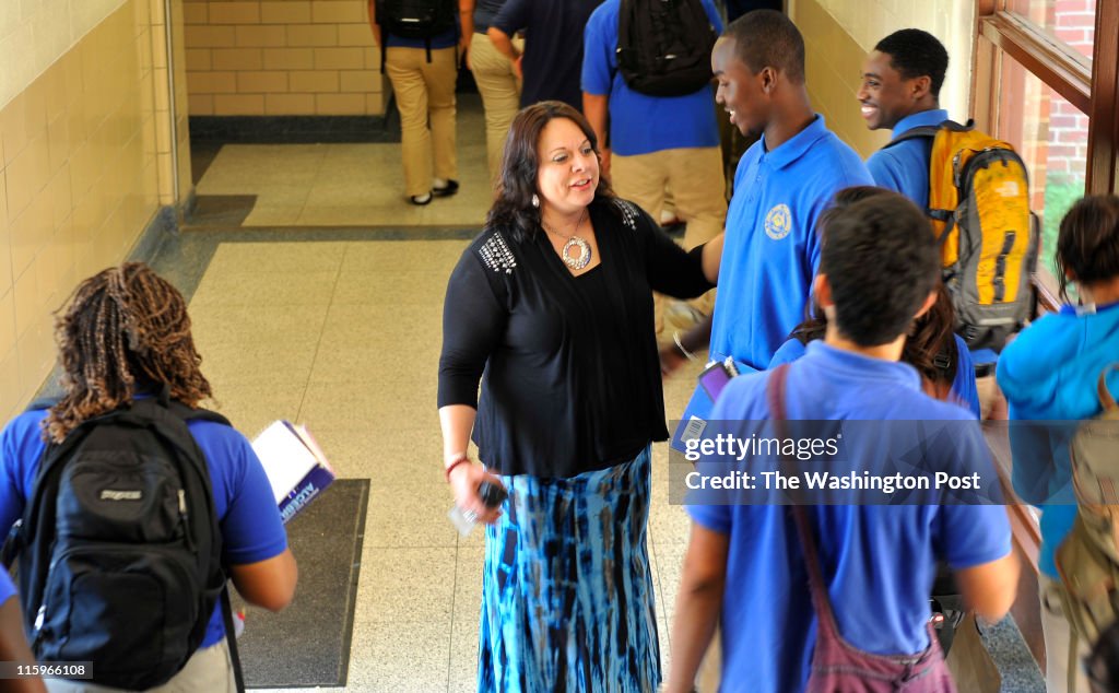 High Point high school principal Rebecca Garcia talked Moussa Ba as