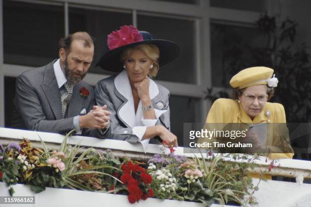 Prince Michael of Kent, Princess Michael of Kent and Queen Elizbeth II watching the horseracing at the Derby meeting, at Epsom racecourse, in Epsom,...