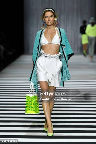 Model walks the runway at the Marc Cain fashion show during the Berlin Fashion Week Spring/Summer 2020 at Velodrom on July 02, 2019 in Berlin,...