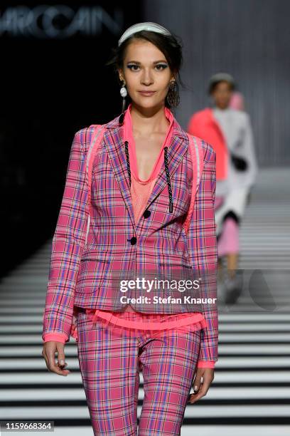 Model walks the runway at the Marc Cain fashion show during the Berlin Fashion Week Spring/Summer 2020 at Velodrom on July 02, 2019 in Berlin,...