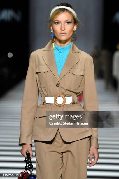 Model walks the runway at the Marc Cain fashion show during the Berlin Fashion Week Spring/Summer 2020 at Velodrom on July 02, 2019 in Berlin,...