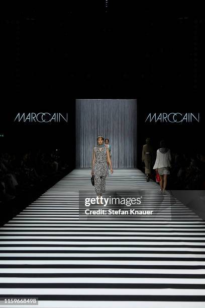 Model walks the runway at the Marc Cain fashion show during the Berlin Fashion Week Spring/Summer 2020 at Velodrom on July 02, 2019 in Berlin,...