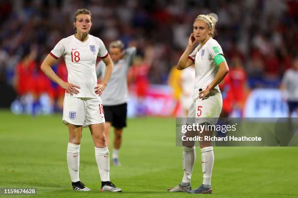 Steph Houghton and Ellen White of England look dejected following the 2019 FIFA Women's World Cup France Semi Final match between England and USA at...