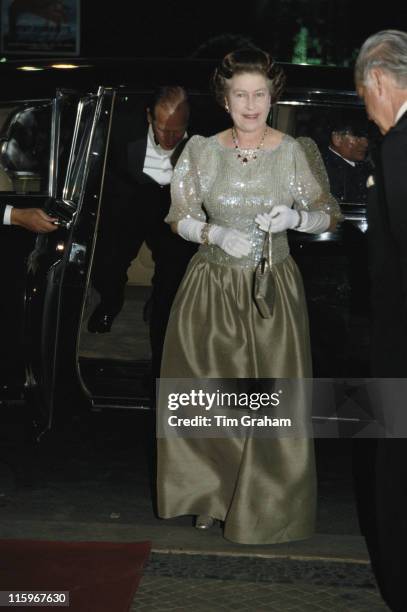 Queen Elizabeth II, wearing a dark green ballgown, to an unidentified event during her five-day state visit to Portugal, 27 March 1985.