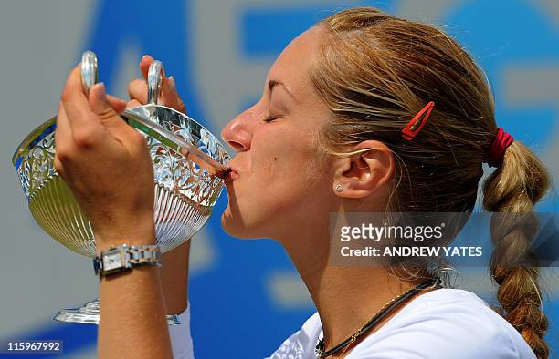 Germany's Sabine Lisicki kisses the Maude Watson trophy after beating Slovakia's Daniela Hantuchova 6-3 6-2 during the final of the WTA AEGON Classic...