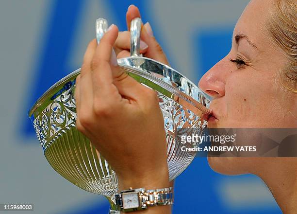 Germany's Sabine Lisicki kisses the Maude Watson trophy after beating Slovakia's Daniela Hantuchova 6-3 6-2 during the final of the WTA AEGON Classic...
