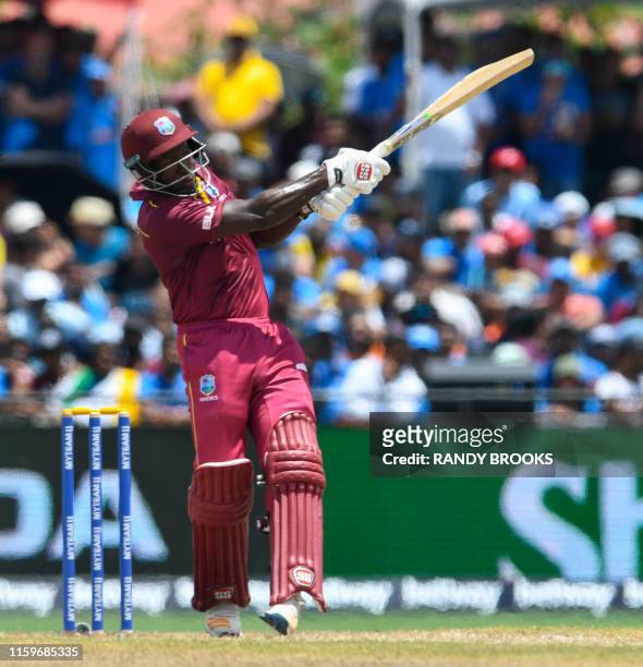 Rovman Powell of West Indies hits 4 during the 2nd T20i match between West Indies and India at Central Broward Regional Park Stadium in Lauderhill,...