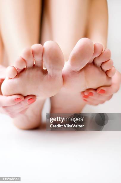 feet - woman foot massage stock pictures, royalty-free photos & images