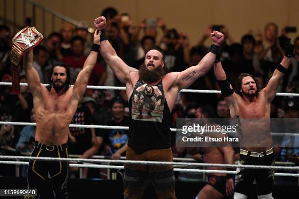 Seth Rollins and Braun Strowman and AJ Styles celebrate the victory during the WWE Live Tokyo at Ryogoku Kokugikan on June 29, 2019 in Tokyo, Japan.