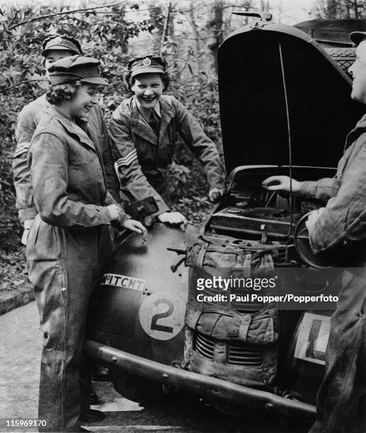 Princess Elizabeth trains as an ATS mechanic at a training centre in southern England, April 1945. At this stage she is a Second Subaltern of the ATS...