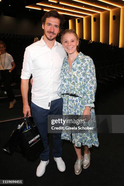 Former skier and world champion Felix Neureuther and his wife Miriam Neureuther during the premiere of the movie "Playmobil der Film" at Mathaeser...