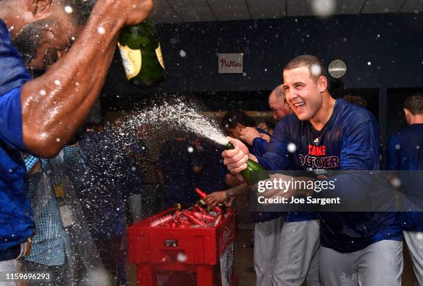 Anthony Rizzo of the Chicago Cubs celebrates with Dexter Fowler after defeating the Pittsburgh Pirates 4-0 in the National League Wild Card Game on...