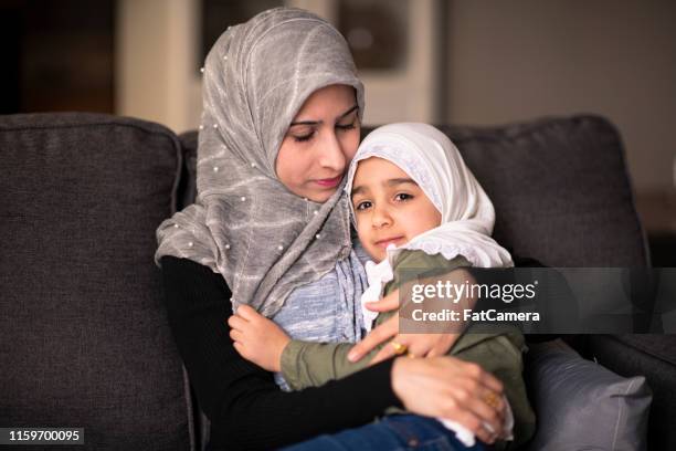 loving relationship - refugee babies stock pictures, royalty-free photos & images