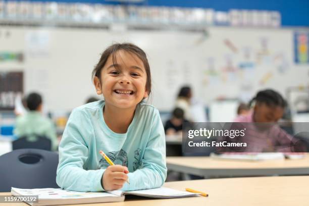 little girl hard working - school desk stock pictures, royalty-free photos & images