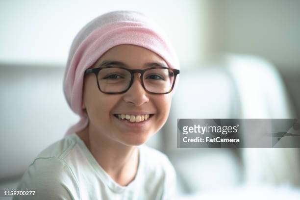 little girl with cancer - childhood cancer stock pictures, royalty-free photos & images