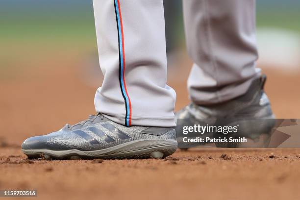 Detailed view of Adidas baseball cleats are seen as the Miami Marlins play against the Washington Nationals during the first inning at Nationals Park...